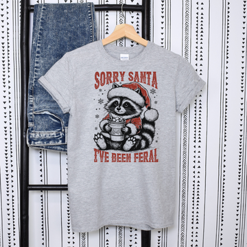 Sorry Santa, I’ve Been Feral Christmas Humor T-Shirt – Holiday Graphic Tee